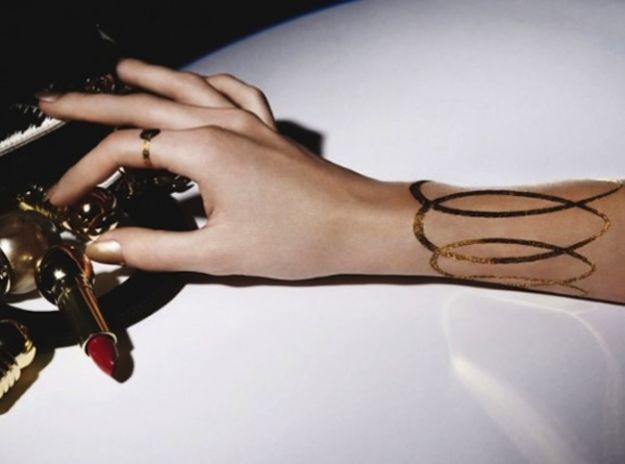 tatuaggi oro dior