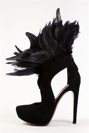 black high heel closed toe sandal with feather trim around ankle