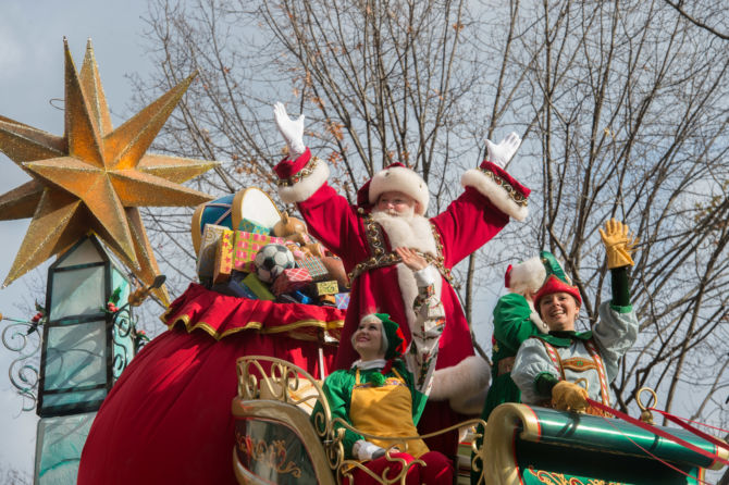 Santa Claus waves from a float during the Macy's Thanksgiving Day Parade, Thursday, Nov. 26, 2015 in New York. (AP Photo/Bryan R. Smith)